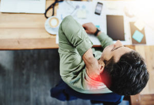 man has neck pain